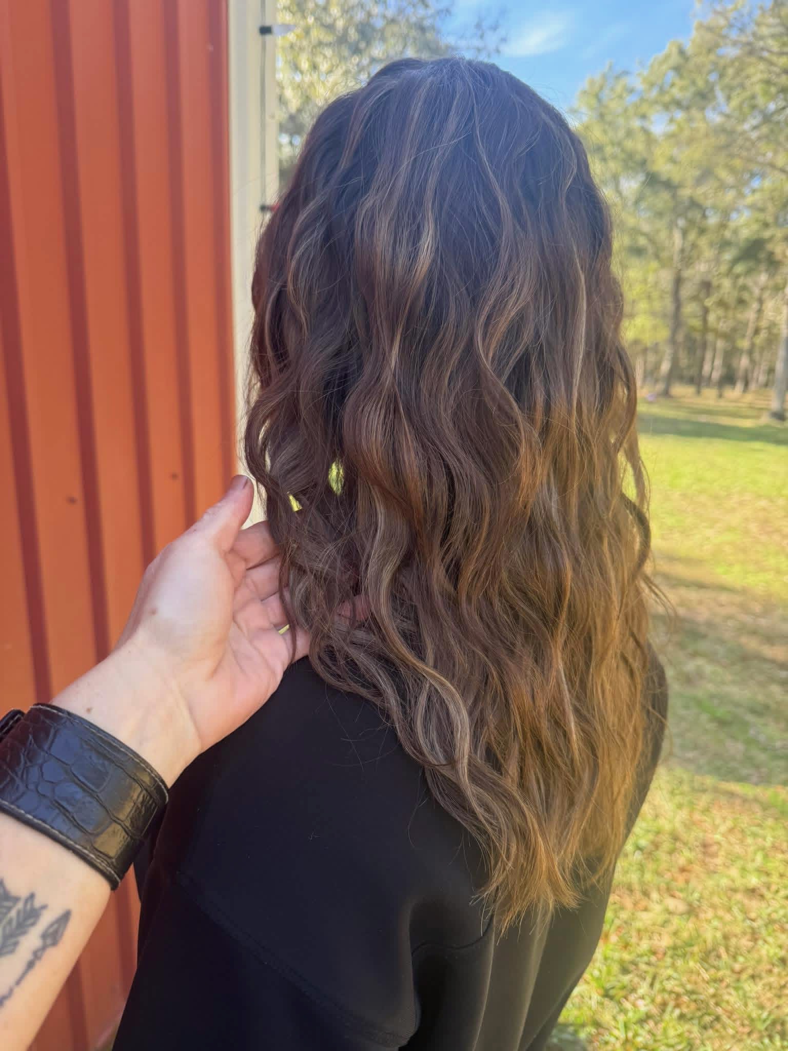 Warm brunette hair in natural light